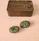Pair of silver ear clips with carved jade