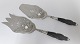 Silver fish serving set with wooden handle (830). Length 26 cm. Produced 1923 & 
1924