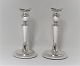 Silver candlesticks with oval base (830). Stamped E T J. A pair. Height 19 cm.