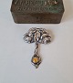 Vintage silver brooch in the shape of roses with amber pendant