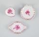 Three small Herend "Pink Indian" porcelain pieces with hand-painted purple 
flowers and gold decoration.