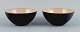 Two "krenits" bowls in metal.
Beige.