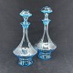 A pair of sea blue decanters from Kastrup Glasværk