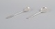 Evald Nielsen, Danish silversmith, two hammered sugar spoons in Danish 830 
silver. One spoon model number 14.