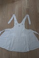 Apron, an old Danish apron
With embroidery made by hand
H: 84cm
In a good condition