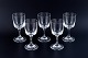 A set of five René Lalique Chenonceaux red wine glasses.Clear mouth-blown crystal glass. Facet-cut stem.
