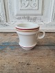 French café brûlot cup in strong iron porcelain decorated with red and yellow 
stripes