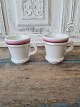 Par franske café brûlot kopper i kraftigt jern porcelæn dekoreret med lyserød, 
sort og guld striber