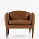 Illum Wikkelsø / Holger Christensen
Model V12 - Easy chair in dark brown leather and rosewood legs.
1 pc. in stock
Good, used condition
