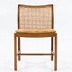 Ditte & Adrian Heath / Søren Horn
Model 143 - Dining chair in walnut with French wicker and patinated natural 
leather cushion. Designed in 1961.
1 pc. in stock
Good, used condition
