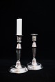 A pair of fine old Svend Toxsværd silver candlesticks with a pearl edge...