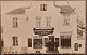 Ubrugt postkort: Butiksfacade- Købmandshandlen ca. 1920