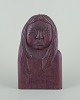 L'Art presents: 
Greenlandica, 
wood relief of 
a Greenlandic 
woman.