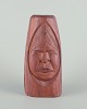 L'Art presents: 
Greenlandica, 
wood sculpture 
of a male 
figure.