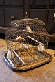 Decorative, antique 19th century French metal birdcage on a brass tray...