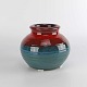 Kinnerup Antik 
& Porcelæn 
præsenterer: 
Stentøj 
vase
6101 10
Søgrøn og rød