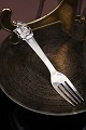 K&Co. presents: 
Old 
children's fork 
in silver with 
a motif from H. 
C. Andersen's 
fairy tale "The 
Fireworks"...