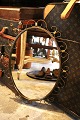 Oval vintage mirror with decorated brass frame from the 70s...