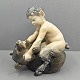 Antik 
Damgaard-
Lauritsen 
præsenterer: 
Royal 
Copenhagen; 
Porcelænsfigur, 
Faun med bjørn 
#648