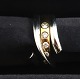 Georg Jensen. Magic ring hvid & rødguld 18K med 5 brillanter (750). 
Ringstørrelse  55. Design Regitze Overgaard