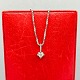 Antik 
Damgaard-
Lauritsen 
presents: 
Toftegaard; 
A necklace in 
14k white gold 
set with a 
diamond