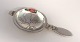 Lundin Antique 
presents: 
Georg 
Jensen. Cactus. 
Tea strainer. 
Sterling silver 
(925). Length 
13.5 cm