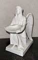 Reutemann Antik 
presents: 
B&G 
Bisquit 
figurine of the 
Angel of 
Baptism by 
Thorvaldsen