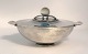 Lundin Antique 
presents: 
Georg 
Jensen. 
Sterling (925). 
Bowl with lid. 
Design: Harald 
Nielsen. Model 
689. ...