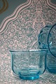 K&Co. presents: 
12 pieces. 
Holmegaard 
mouth-blown 
rinsing bowls 
in turquoise 
glass from 
around 1920...