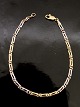 Middelfart 
Antik presents: 
14 carat 
red and white 
gold bracelet