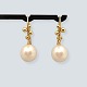 Antik 
Damgaard-
Lauritsen 
presents: 
Dulong; 
Pair of Delphis 
Pearl earrings 
in 18 kt. gold 
with pearls