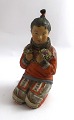 Royal Copenhagen. Figurine of Greenlandic girl. Model 12415. Height 14.5 cm. (1 
quality)