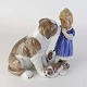 Kinnerup Antik 
& Porcelæn 
præsenterer: 
RC figur
351
Pige med Sankt 
Bernhard og 
hvalpe
16 cm