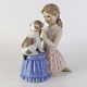 Kinnerup Antik 
& Porcelæn 
præsenterer: 
RC figur
452
Pige med 
hundehvalp
17,5 cm