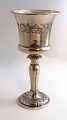Lundin Antique 
præsenterer: 
Andreas 
Kiær Lund, 
Silkeborg. Sølv 
drikkeglas 
(830). Højde 
17,5 cm. 
Produceret ...