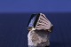 Antik Huset 
præsenterer: 
Herrering 
i 18 karat 
guld, med sort 
onyx. Stemplet 
750. 
Ringstørrelse 
63,5