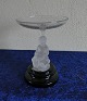 Antikkram 
præsenterer: 
Visitkortskål
med 
figur af 
frossen glas H 
13cm