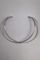 Danam Antik 
præsenterer: 
Georg 
Jensen Sterling 
Sølv Halsring 
No. 554 
Alliance