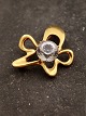 Middelfart 
Antik 
præsenterer: 
Georg 
Jensen "Splash" 
broche med 
cubic zirkon 
#321