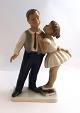 Lyngby porcelæns fabrik. Pige og dreng. Model 93. Højde 21 cm. (1 sortering)