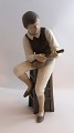 Bing & Gröndahl. Porzellanfigur. Mandolinenspieler. Modell 1600. Höhe 28,5 cm. 
(1 Wahl).