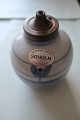 Søholm oil-lamp
Søholm højbrændt stentøj, Denmark, Dansk kvalitet 
(Quality from Denmark)
Stamped
From the 1960-Years
H: 8 cm
B: 7 cm
In a good condition