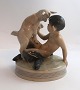 Royal Copenhagen. Porcelænsfigur. Faun med ged. Model 498. Højde 12 cm. (3 
sortering)