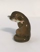 Königliches 
Kopenhagen. 
Porzellanfigur. 
Otter mit 
Fisch. ...