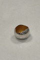 Danam Antik 
præsenterer: 
Georg 
Jensen Sterling 
Sølv Saltkar 
med Gul Emaje 
af Søren Georg 
Jensen No. 1067