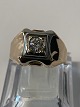 Signet ring with clear stone, in 18 carat Red / white gold.
Size: 64