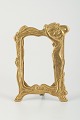 Elegant Art 
Nouveau Brass 
Frame with 
Female Figure, 
c. 1900.