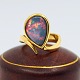 Georg Jensen; 
Ring i 18 kt. 
guld med opal