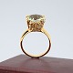 Ring i 14 kt. 
guld med topas