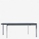 
Poul Kjærholm / Fritz Hansen.
PK 61 - Coffee table with glass top on steel frame. Manufacturer